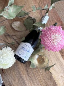 Sparkling wine with pink and white flowers