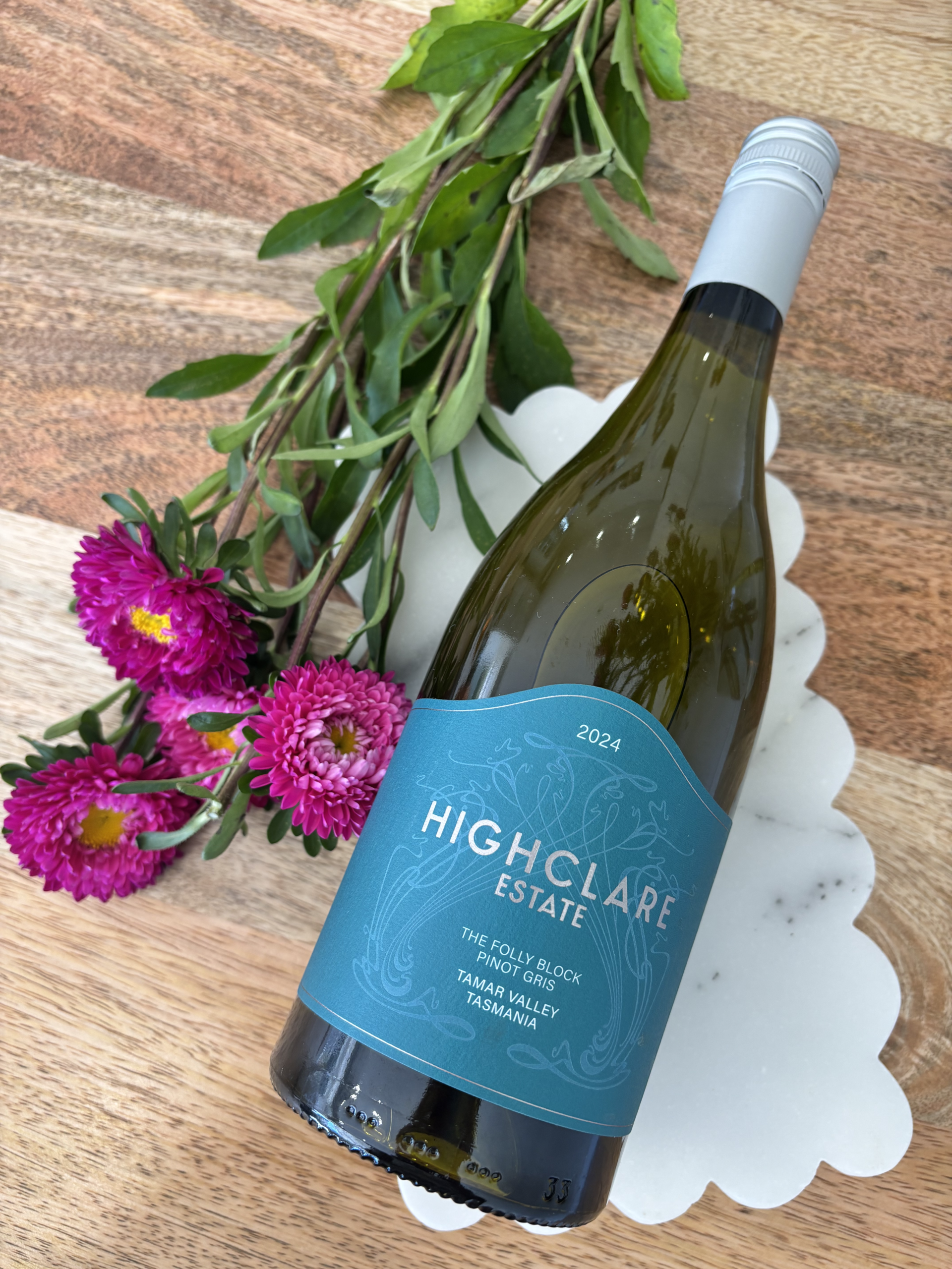 Highclare Estate wine bottle with pink flowers